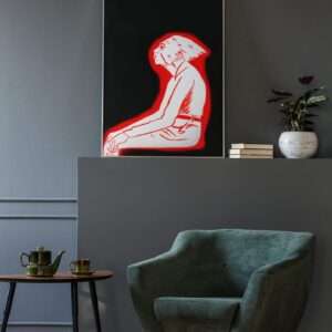 Druck einer sitzenden Figur in roter Silhouette auf schwarzem Hintergrund – grafisches Kunstwerk von Nia Moody9