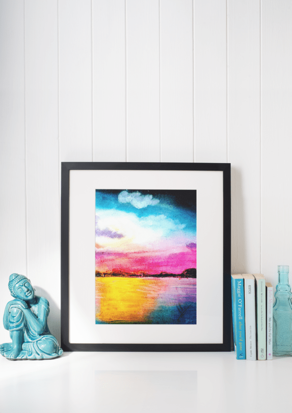 Druck eines farbintensiven Sonnenuntergangs mit Wasser und Himmel in Magenta, Blau und Gelb – Kunstwerk von Nia Moody3